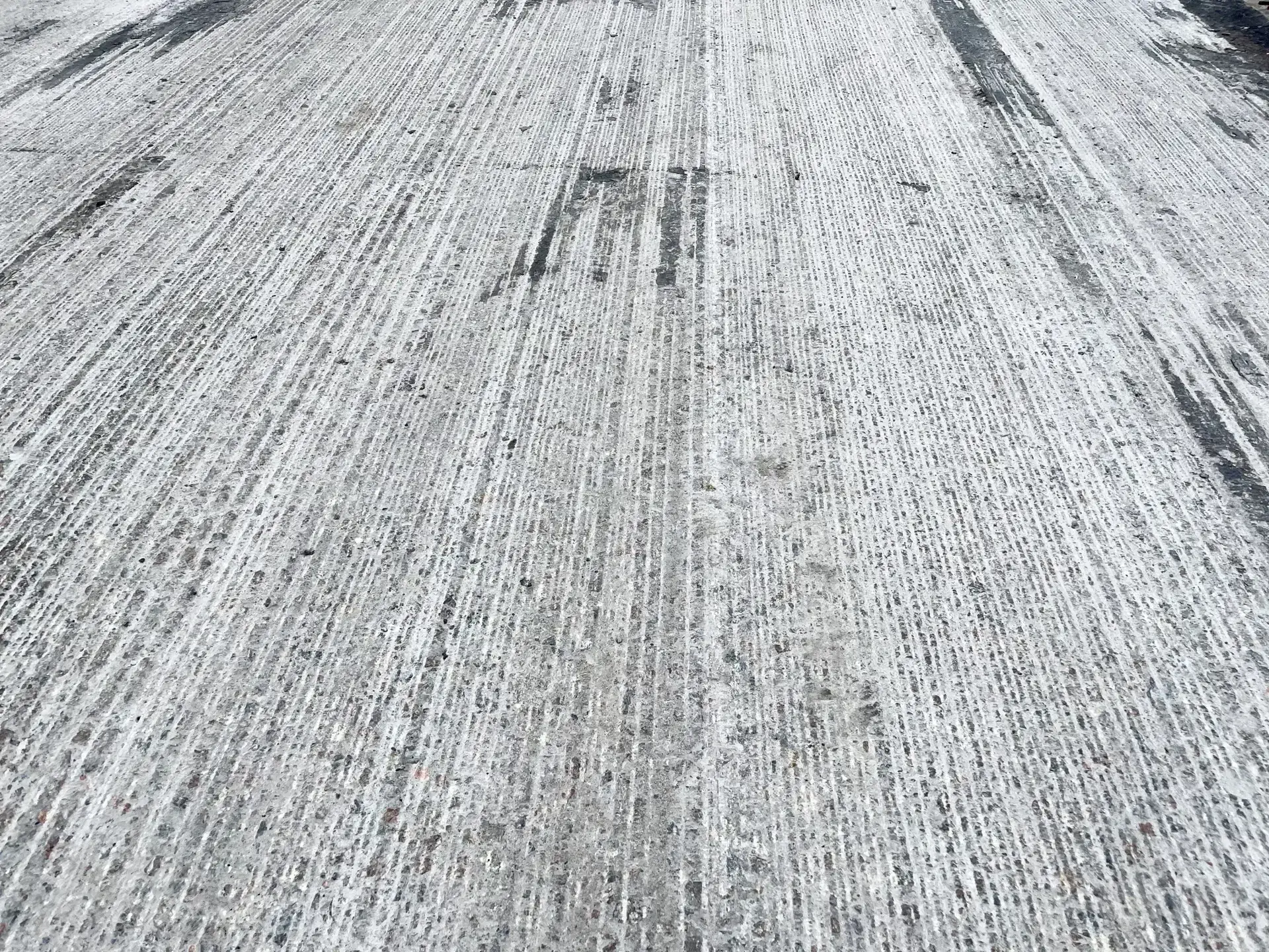 Milling of the road surface for laying new asphalt. Background of milled asphalt